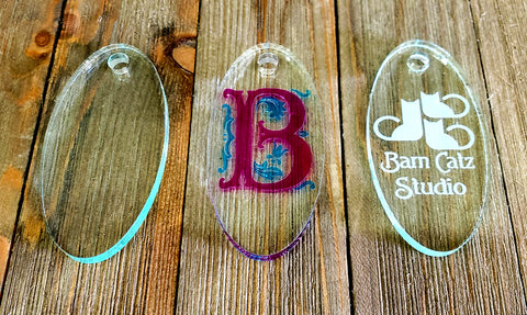 Example of decorated oval keychain blanks.