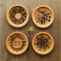 Sophisticated Christmas images in a vintage hand-drawn style for traditional holiday decor. Great as a gift for your favorite holiday host, or just for you!  Set of four coasters, laser engraved on natural cork. Coasters are 4” in diameter, the inner surface is 3.375” in diameter. 