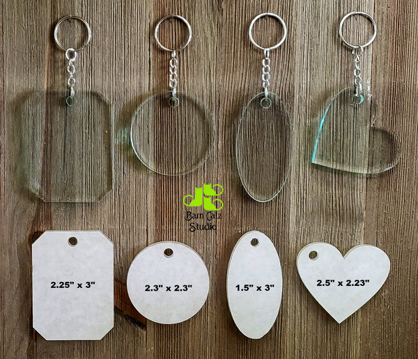 1/4" Cast Acrylic shapes made into keychains for crafting. Shapes include; Elongated octagon 2.25" x3", Circle 2.3" x2.3", Oval 1.5" x 3", and Heart 2.5" x 2.23".